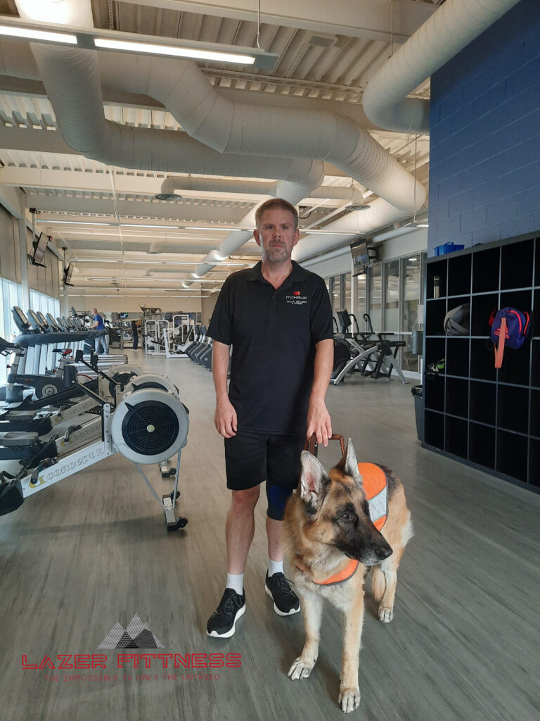 Home Bob and his retired guide dog, Lazer, at the Wayne Gretzky Sports Centre
