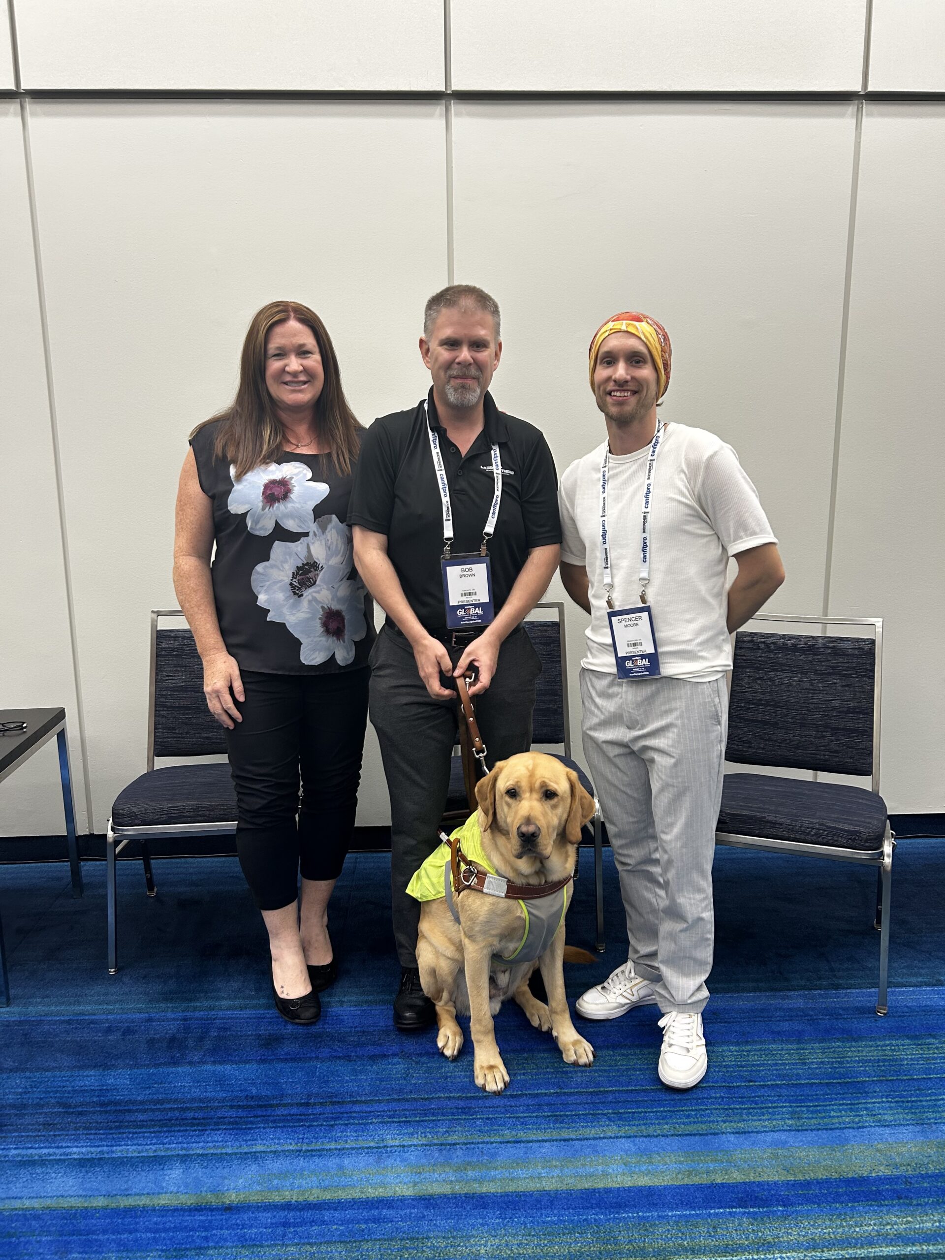 Home Tara, Spencer, Booker and I at Canfitpro from our presentation Adaptive Fitness Coaching: Training Strategies for Every Body.